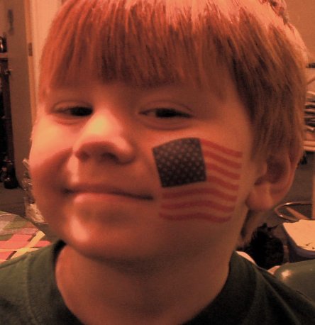 Chris with his American flag temporary tattoo to match his soldier costume.